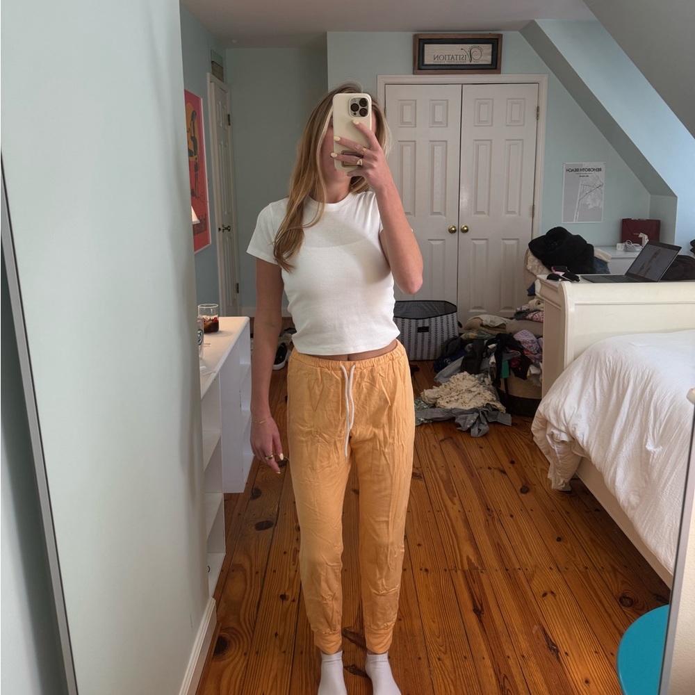 Orange joggers from a boutique